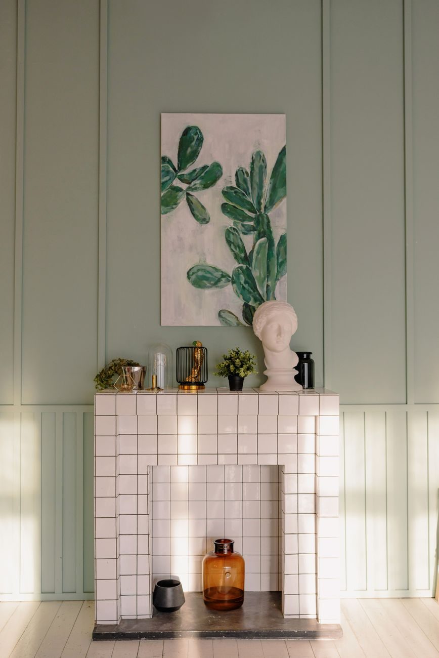 White square tile fireplace surround set floor to mantel as one idea for tiling a fireplace