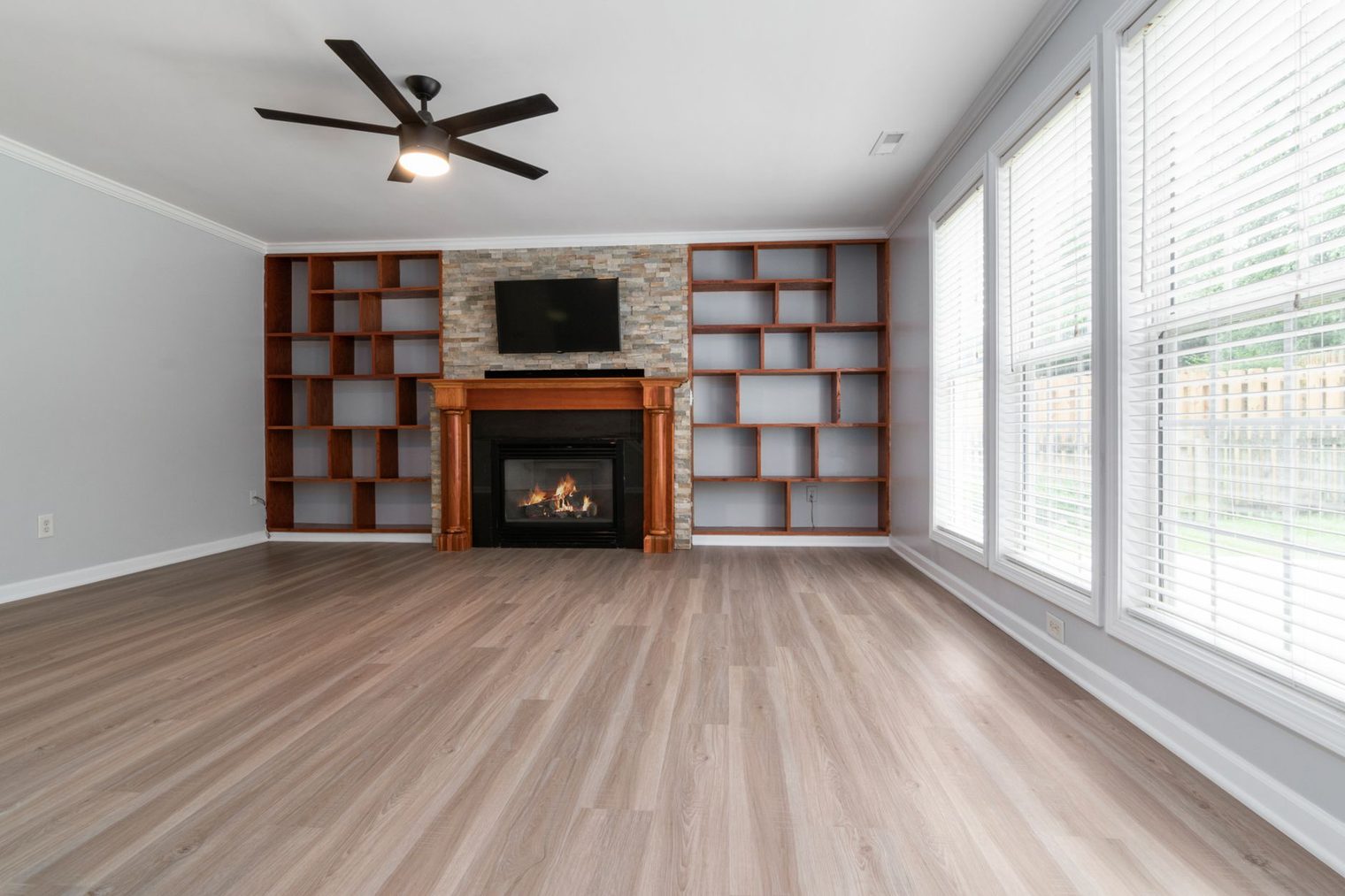 Bright living room with a warm wood-look plank floor