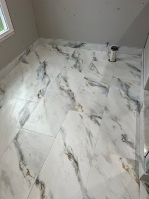 Large format marble-effect floor tiles