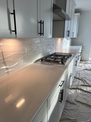 Textured wave tile kitchen backsplash